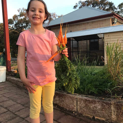 Emma with her carrots